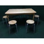 A beech wood kitchen table and six stools