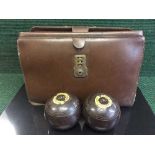 A leather bag of seven composite bowling balls