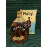 A bottle of Haig Dimple whiskey in presentation box
