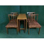 A six piece teak dining room suite