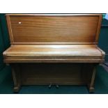 A mahogany cased piano by Maxime Freres