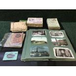 An early 20th century postcard/photograph album,