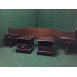 A mahogany stag minstral continental headboard and pair of bedside stands