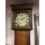 A 19th century oak long cased clock with painted dial J.