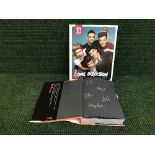 A signed One Direction autobiography, together with the official 2014 annual.