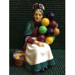 A Royal Doulton figure - Old Balloon Seller HN1315