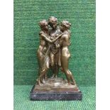 A bronze figure on marble base - three graces