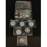 A tin containing assorted Georgian and later coins, some silver, florins, shillings,