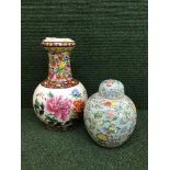 A hand painted oriental style vase and a lidded temple jar