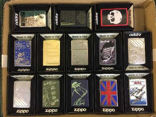 A tray of thirteen Zippo lighters