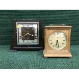 An oak cased Art Deco mantel clock and a pine cased mantel clock