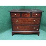 A mahogany stag five drawer chest
