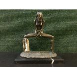 A bronze figure on stone base - Erotic study of standing lady.