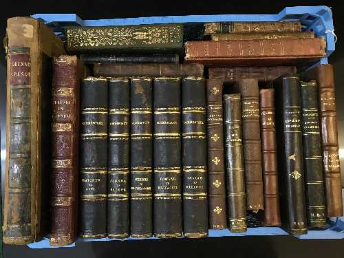 Twenty one antiquarian volumes : Robinson Crusoe, William Greener's The Science of Gunnery,