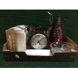 A box of Bravingtons oak cased mantel clock, wine glasses, crystal fruit bowl,