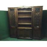 An Old Charm three piece break-front bookcase