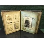 A Victorian embossed leather photograph album,