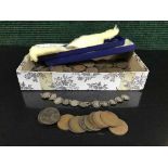 A box of assorted early 20th century British and silver coins,