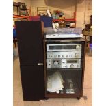 A four piece Technics sperate's system in cabinet and a pair of Mission teak cased speakers