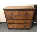 A 19th century oak and inlaid mahogany five drawer chest