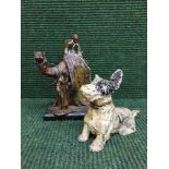 Two metal table lighters modelled as Arabian figures on camel and a dog