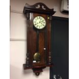 A Victorian mahogany cased wall clock