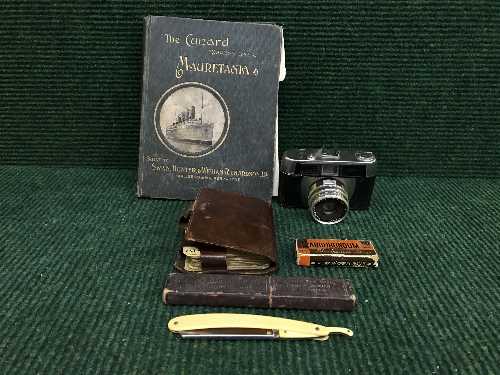 A basket of German cut throat razor, leather card case,