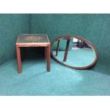 A mid twentieth century tiled teak lamp table together with an Edwardian oak mirror