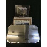A box of unframed mirror, pictures,