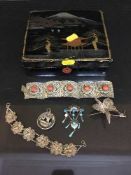 An oriental lacquered box containing continental and sterling silver jewellery