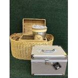 A set of three graduated wicker baskets, picnic basket, vases, storage boxes, repro.