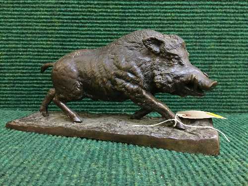 A bronze figure of a boar