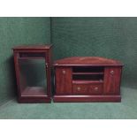 A mahogany stag entertainment unit together with an audio cabinet