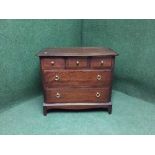 A mahogany stag five drawer chest