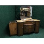 A three piece early 20th century walnut bedroom suite