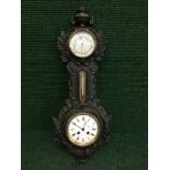 A Victorian cast iron barometer clock