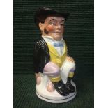 An early 20th century English pottery toby jug
