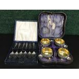 A set of four cased Elkington salts, with four salt spoons.