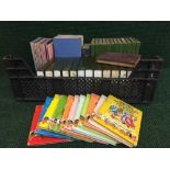 Two boxes containing Reader's Digest books, Noddy books,