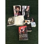 A collection of books relating to rock and pop including signed volumes by Ozzy Osbourne,