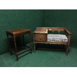 An oak telephone table together with an occasional table