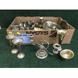 A box of early 20th century plated ware including cruet sets, baskets, napkin rings,