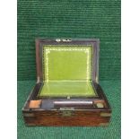 A Victorian rosewood brass bound writing box