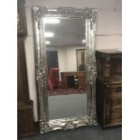 A Victorian style silvered mirror