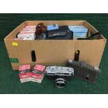 A box of cameras by Konica, Agfa, camera accessories,