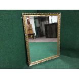 A gilt framed bevelled mirror