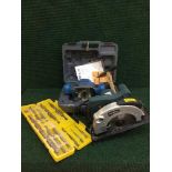 A cased Ryobi router,