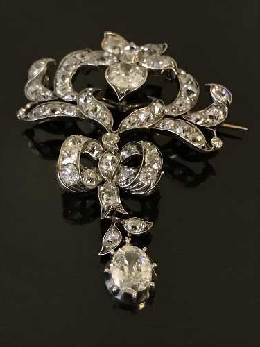 An exceptional diamond brooch, the total diamond weight estimated at 16.00 carats, weighing 14.