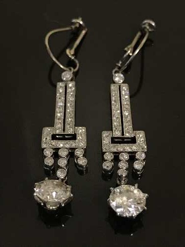 A fine pair of white gold and diamond drop earrings,