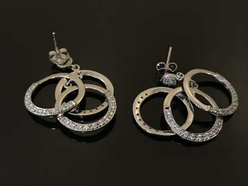 A pair of white gold and diamond set triple-hoop earrings, 6.